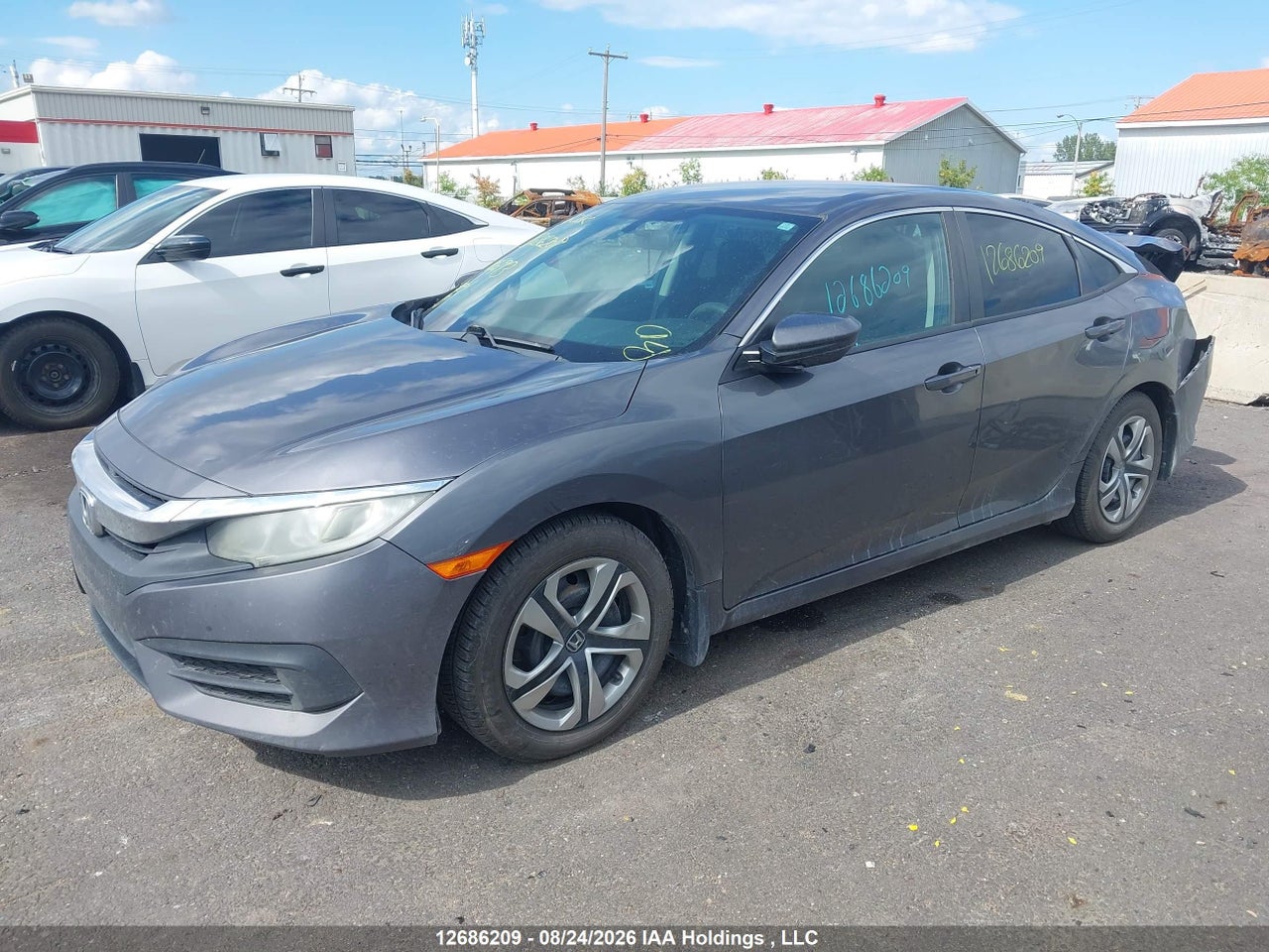 2HGFC2E59GH006193 · 2016 HONDA CIVIC LX · 2/21