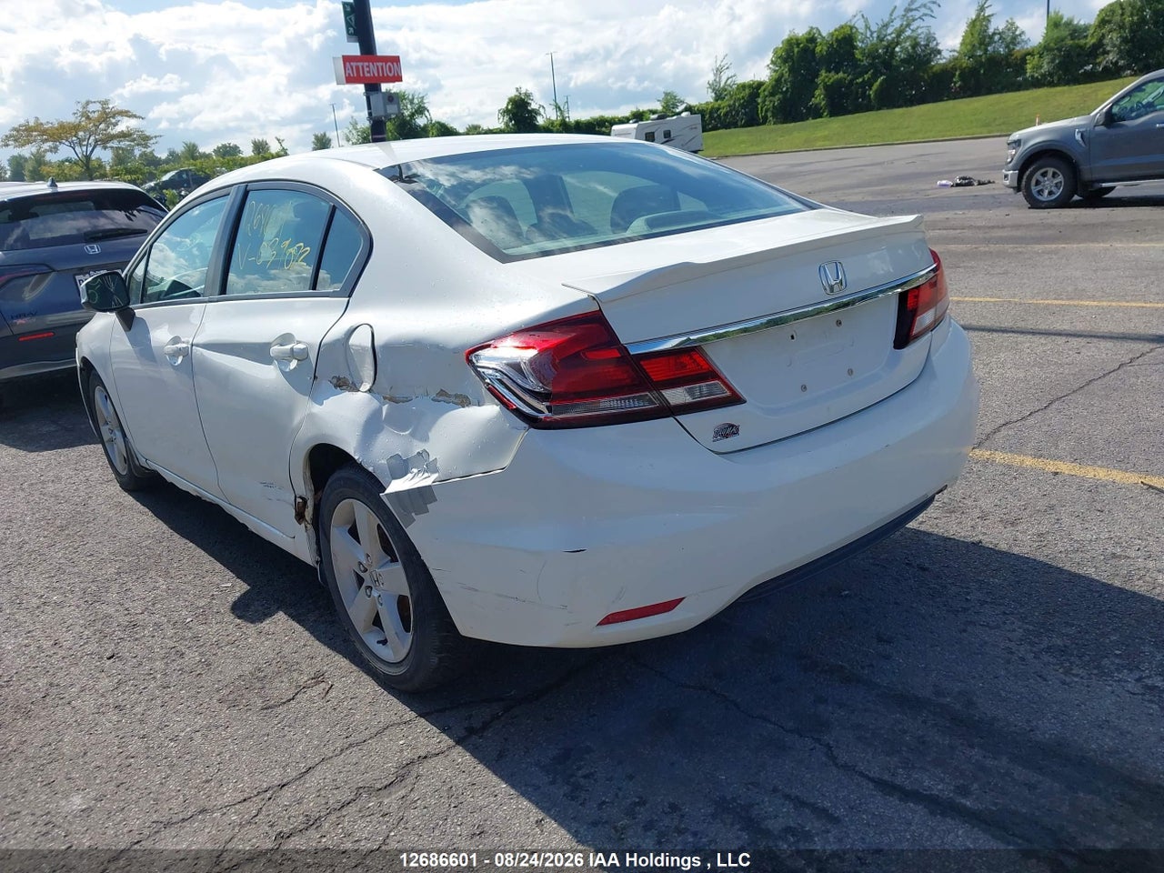 2HGFB2F42DH039072 · 2013 HONDA CIVIC LX · 3/11
