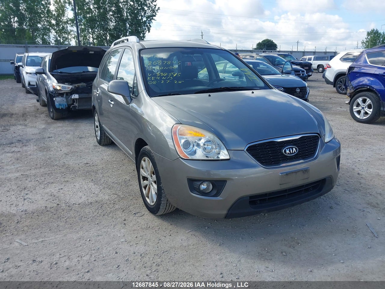 KNAHH8C85B7338545 · 2011 KIA RONDO