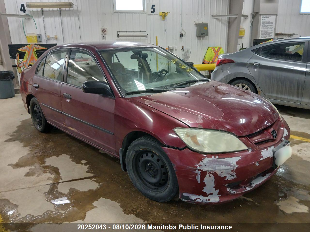 2HGES16334H936141 · 2004 HONDA CIVIC DX