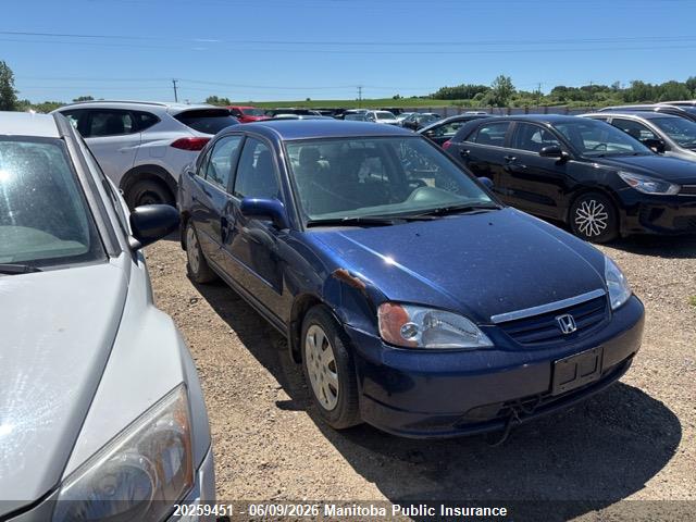 2HGES16663H946817 · 2003 HONDA CIVIC LX