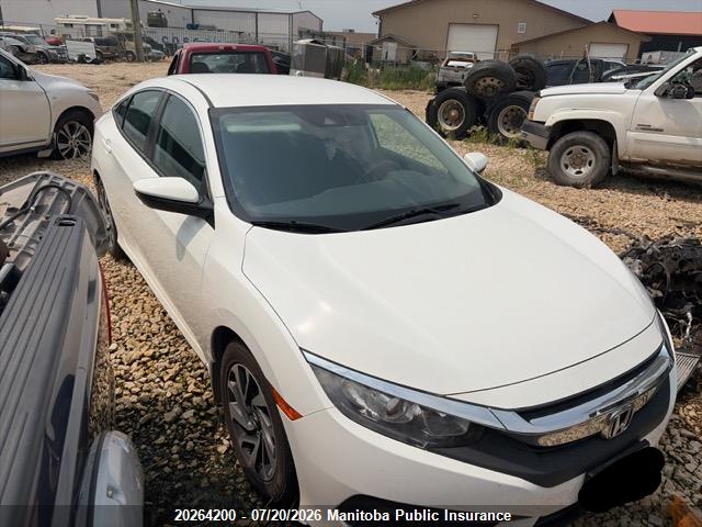 2HGFC2F68JH038311 · 2018 HONDA CIVIC SE