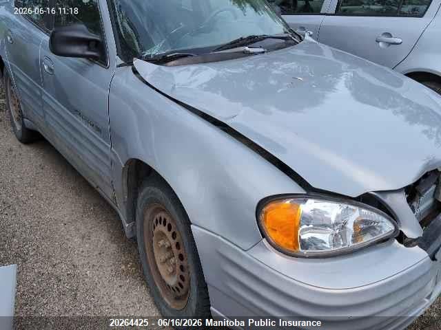 1G2NE52T4XC540105 · 1999 PONTIAC GRAND AM SE