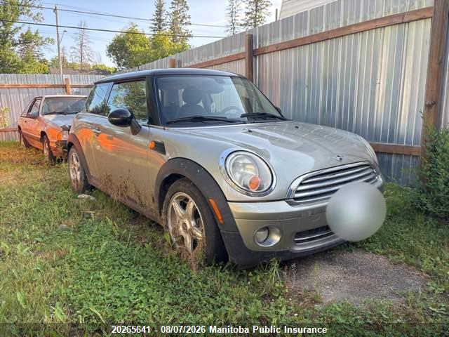 WMWMF33559TW79023 · 2009 MINI COOPER