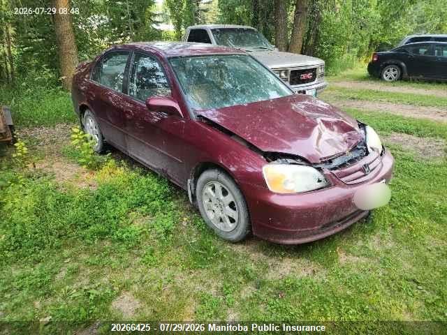 2HGES16863H935432 · 2003 HONDA CIVIC LX