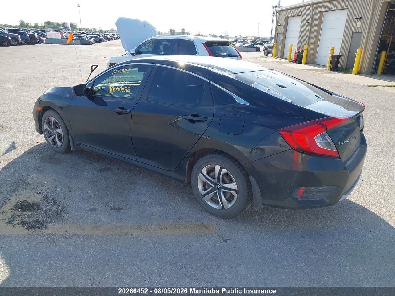 2HGFC2F58KH040052 · 2019 HONDA CIVIC LX · 3/16