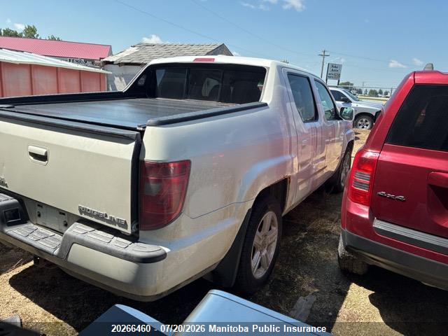 5FPYK1F54AB502462 · 2010 HONDA RIDGELINE RTL · 3/11