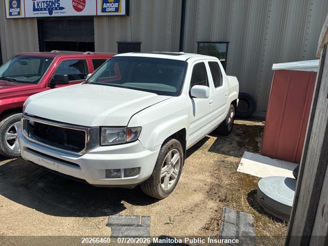 5FPYK1F54AB502462 · 2010 HONDA RIDGELINE RTL · 2/11