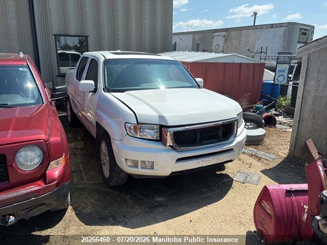 5FPYK1F54AB502462 · 2010 HONDA RIDGELINE RTL