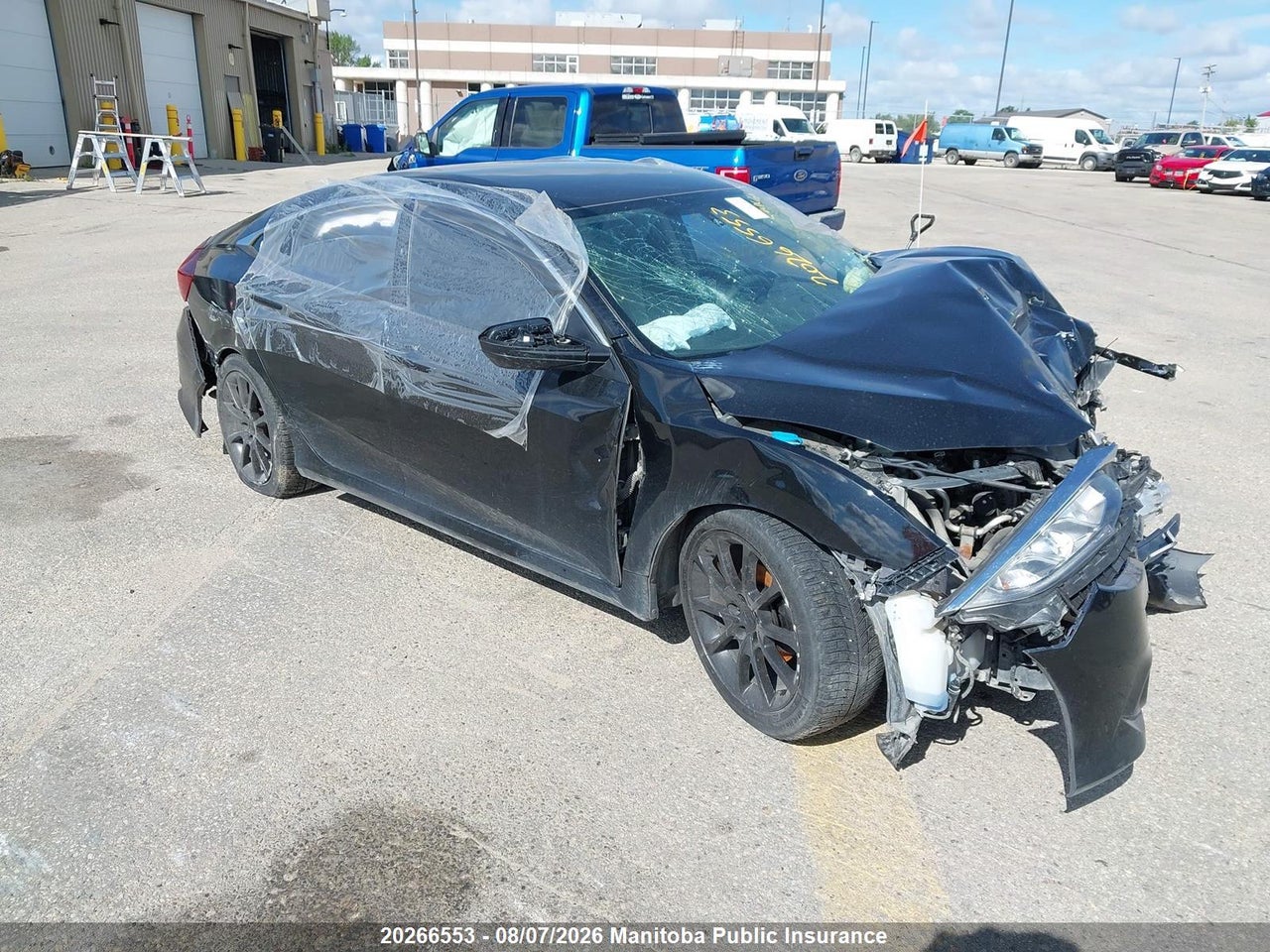 2HGFC2F59JH018737 · 2018 HONDA CIVIC LX