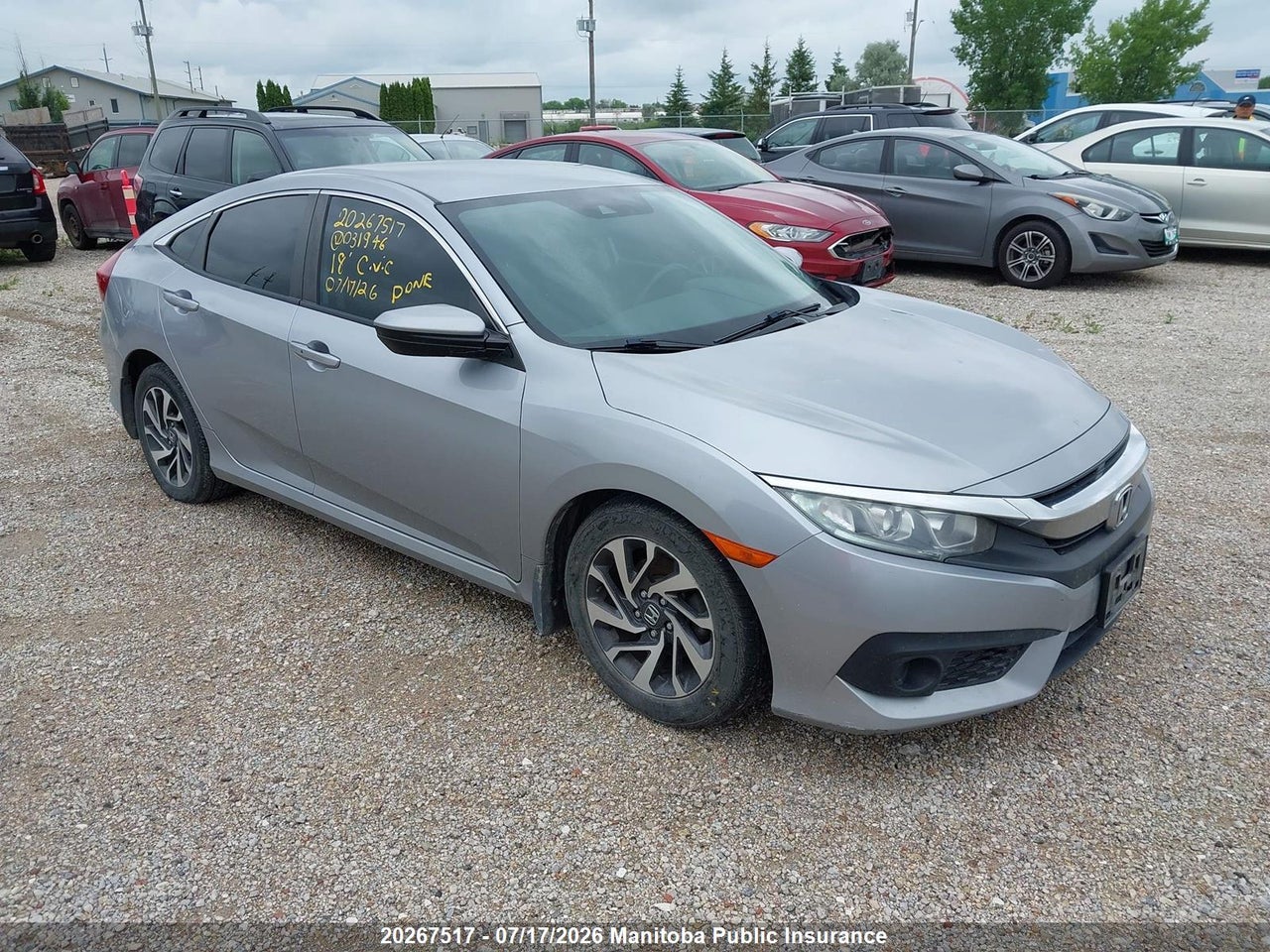 2HGFC2F65JH031946 · 2018 HONDA CIVIC SE