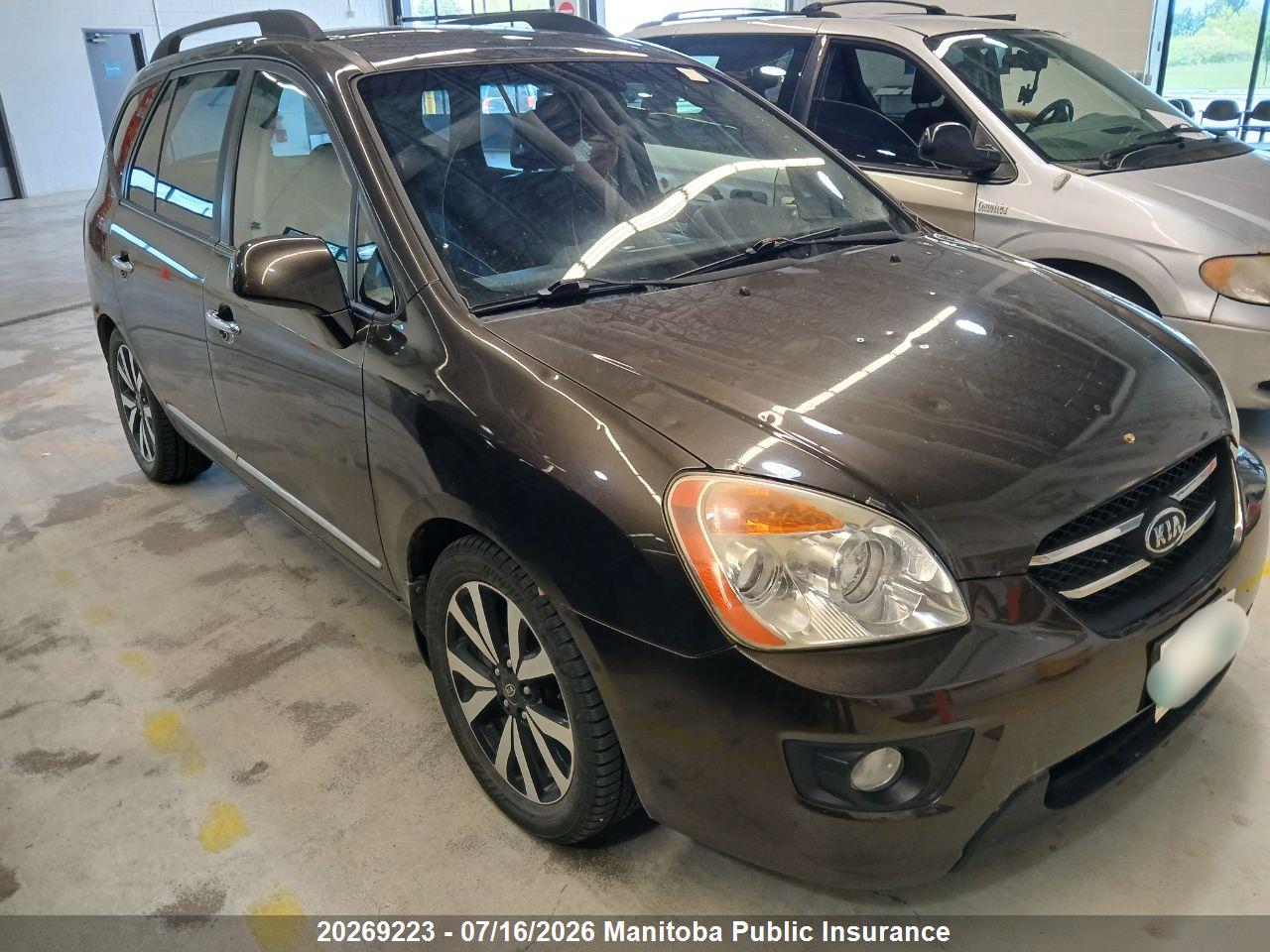 KNAHH8C86A7317055 · 2010 KIA RONDO EX