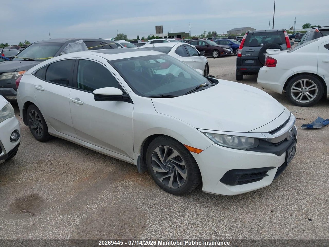 2HGFC2F79GH039856 · 2016 HONDA CIVIC EX