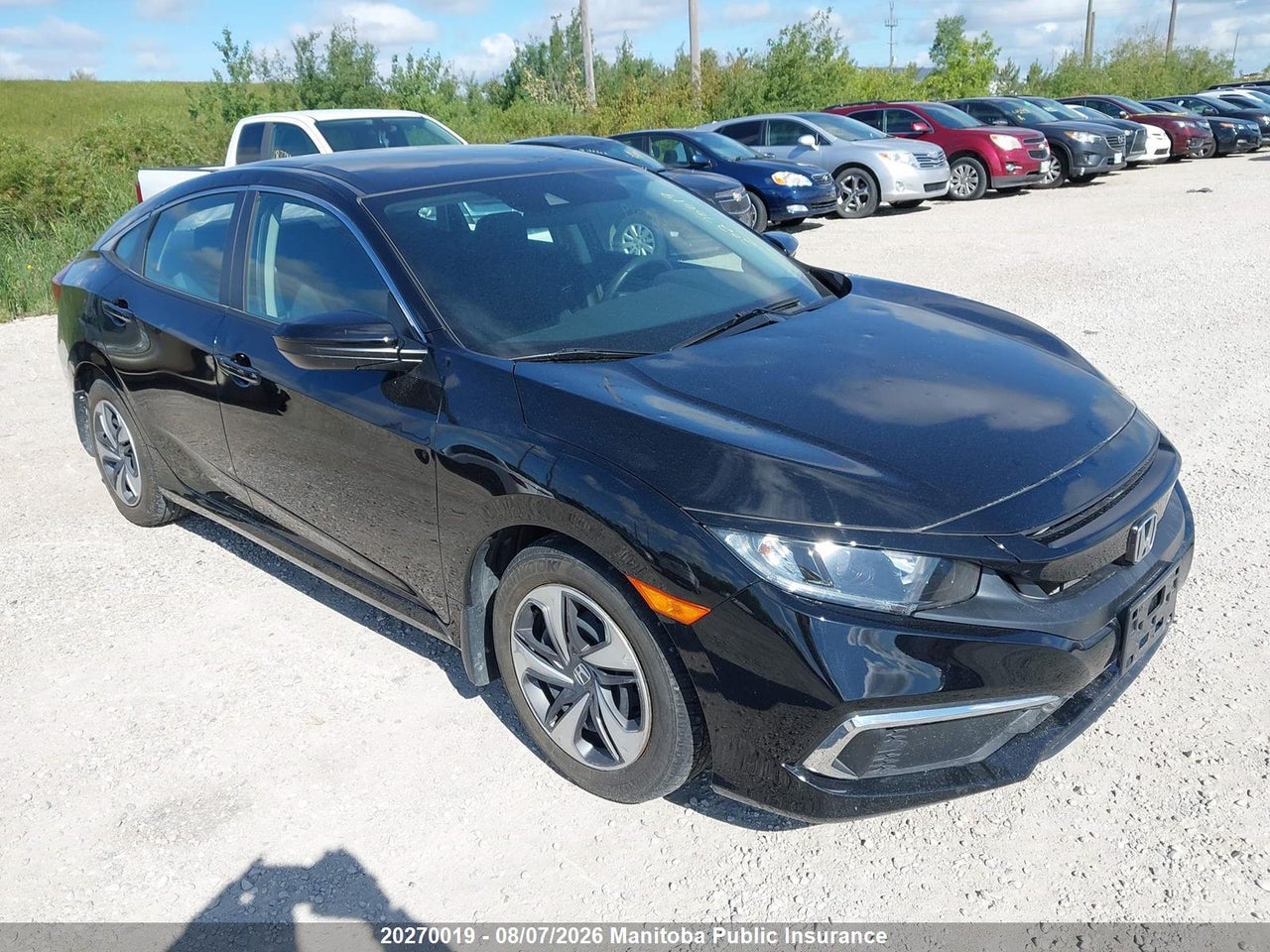 2HGFC2F52MH007034 · 2021 HONDA CIVIC LX