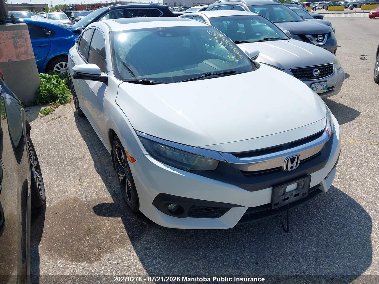 2HGFC1F95GH102463 · 2016 HONDA Civic touring