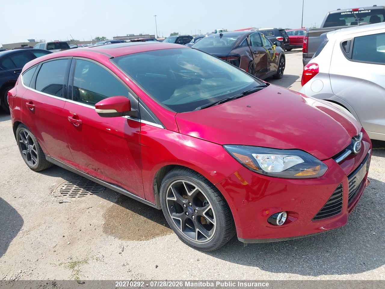 1FAHP3N26CL326162 · 2012 FORD FOCUS TITANIUM
