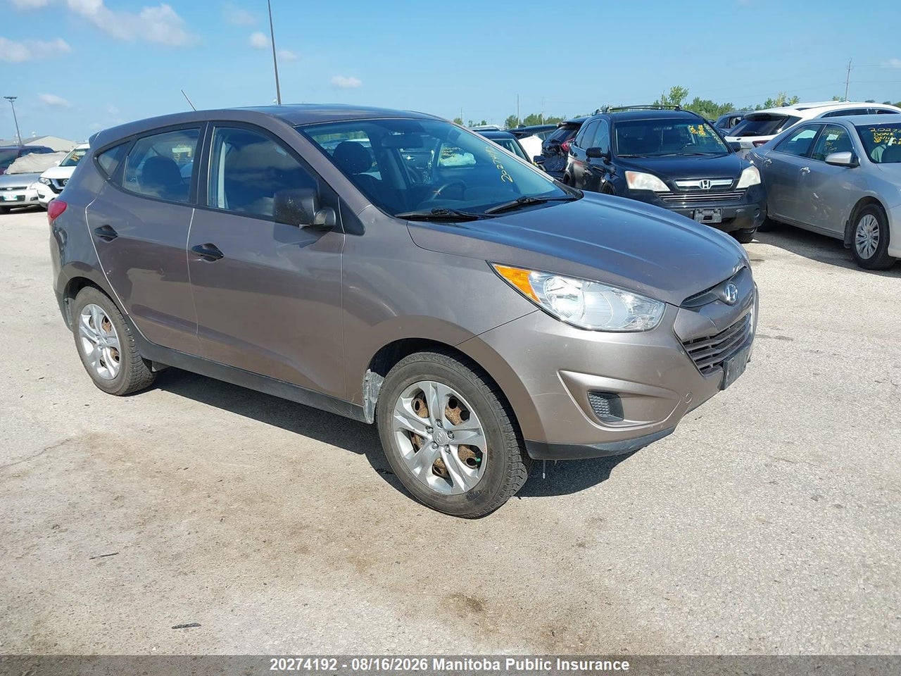 KM8JT3AC9CU476293 · 2012 HYUNDAI TUCSON GL