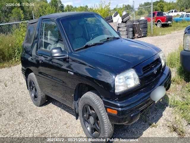 2S3TA52CXX6109356 · 1999 SUZUKI VITARA