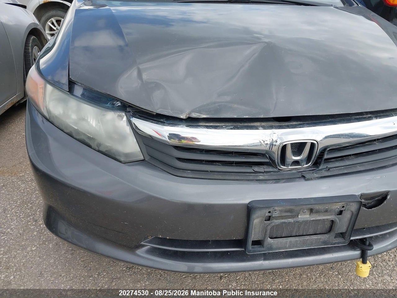 2HGFB2F45CH041672 · 2012 HONDA CIVIC LX · 6/14