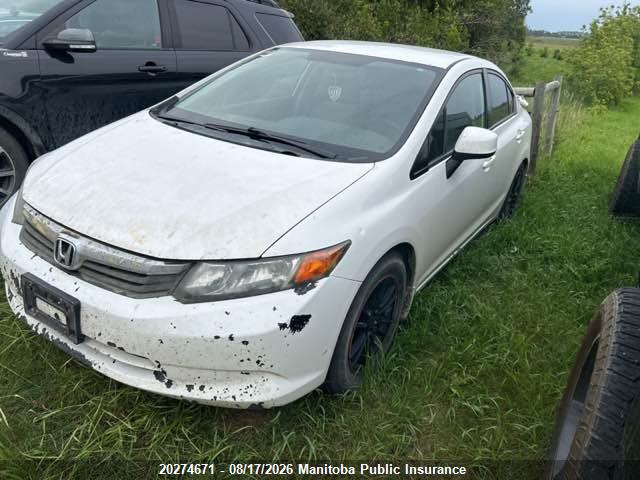 2HGFB2F42CH061068 · 2012 HONDA CIVIC LX · 2/12