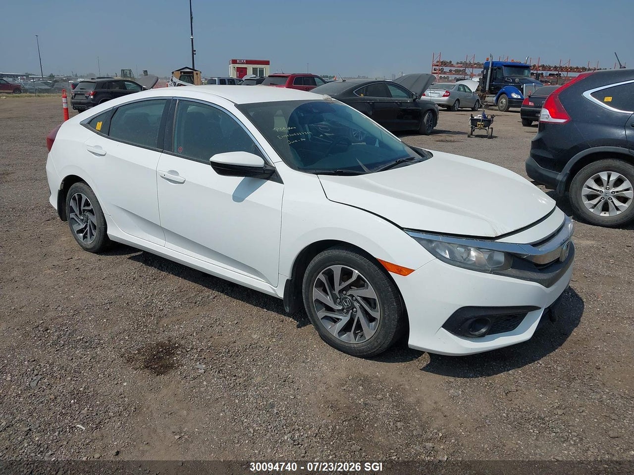2HGFC2F64JH042551 · 2018 HONDA CIVIC LX