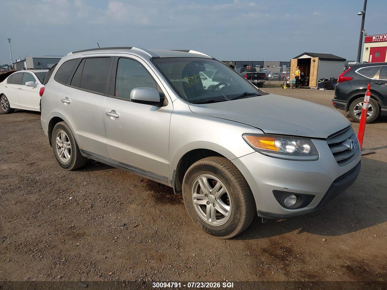 5XYZGDAG7CG165807 · 2012 HYUNDAI SANTA FE GLS
