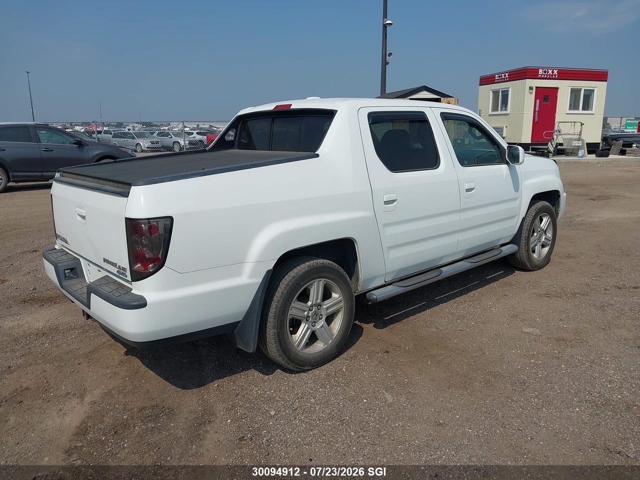 5FPYK1F52BB501957 · 2011 HONDA RIDGELINE RTL · 4/16