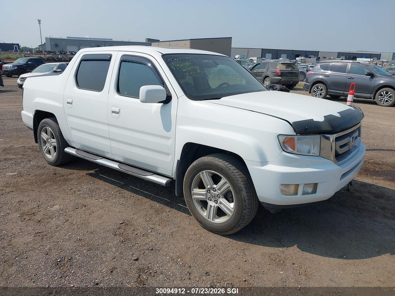 5FPYK1F52BB501957 · 2011 HONDA RIDGELINE RTL