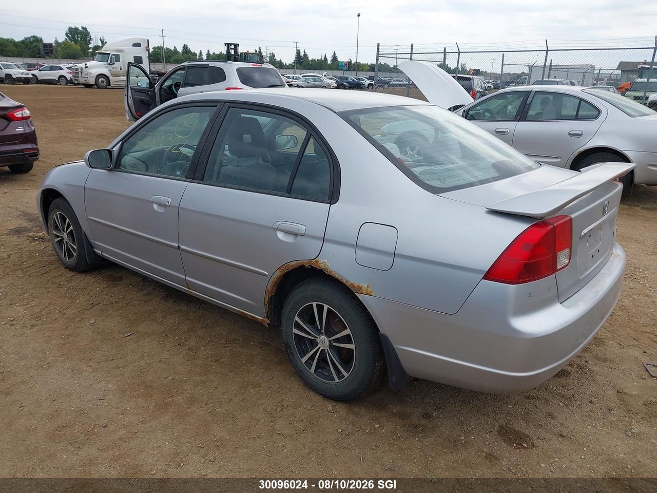 2HGES16833H927191 · 2003 HONDA CIVIC LX · 3/12