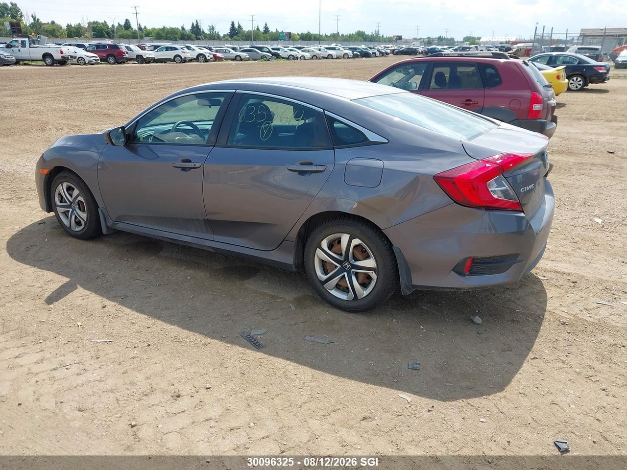 2HGFC2E54GH006098 · 2016 HONDA CIVIC LX · 3/16