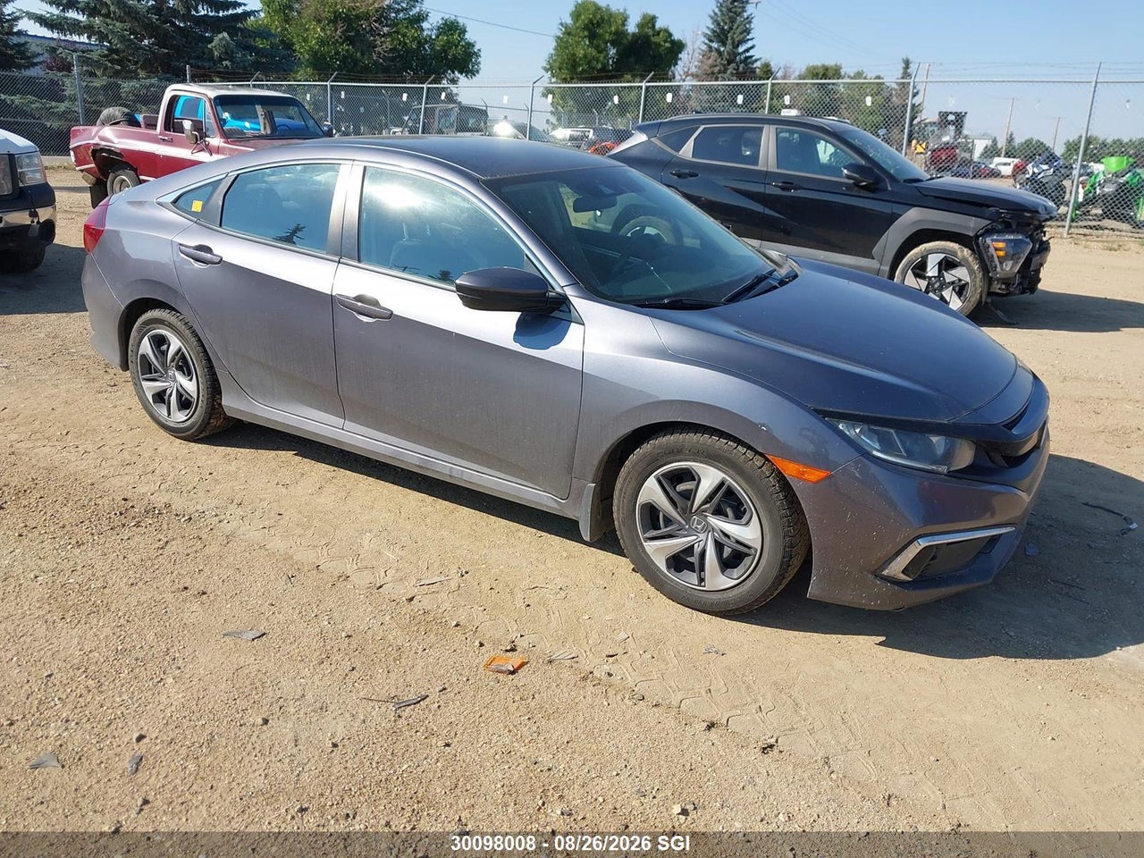 2HGFC2F54LH021855 · 2020 HONDA CIVIC LX