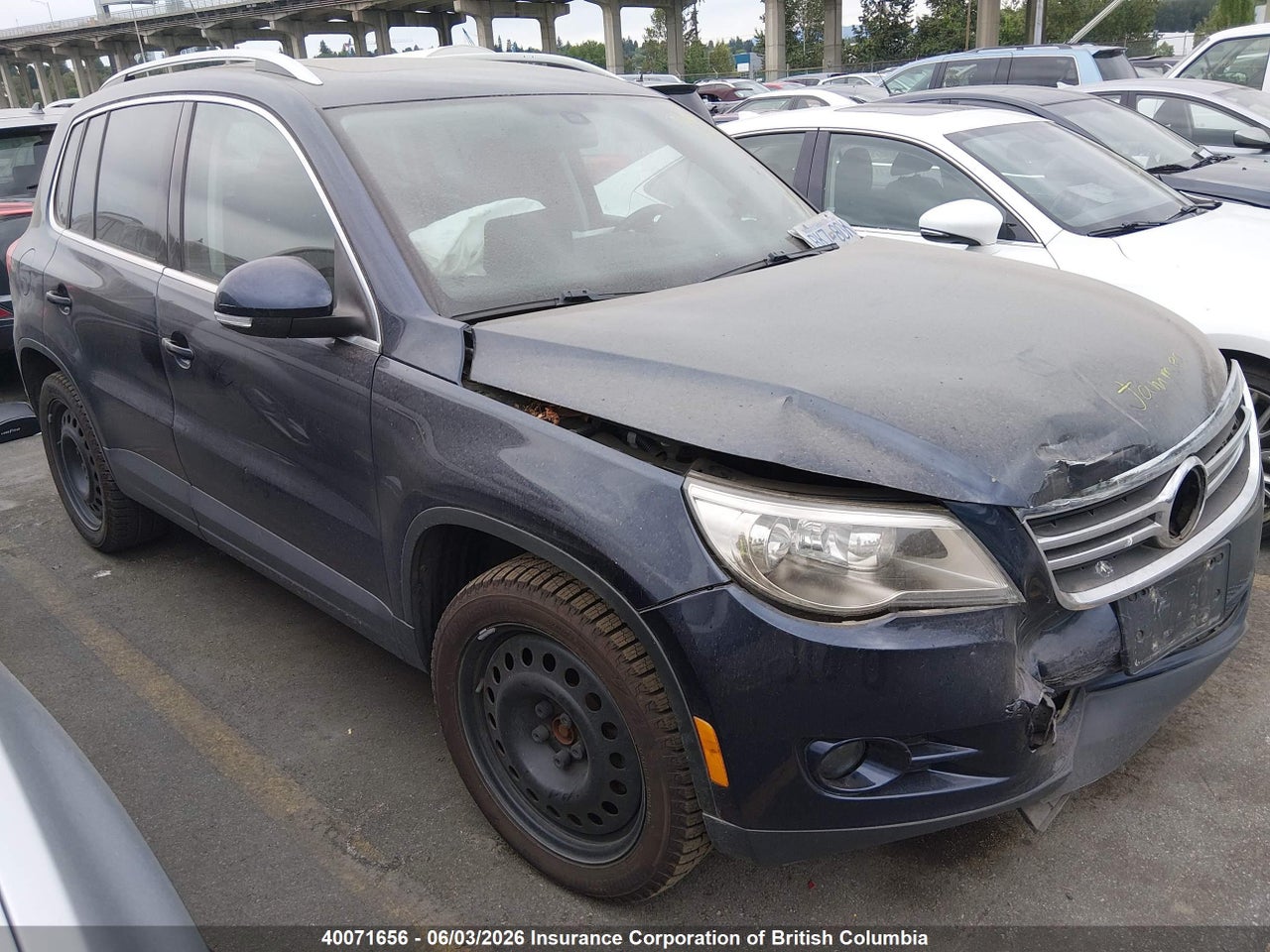 WVGBV7AX7BW534235 · 2011 VOLKSWAGEN TIGUAN S/SE/SEL