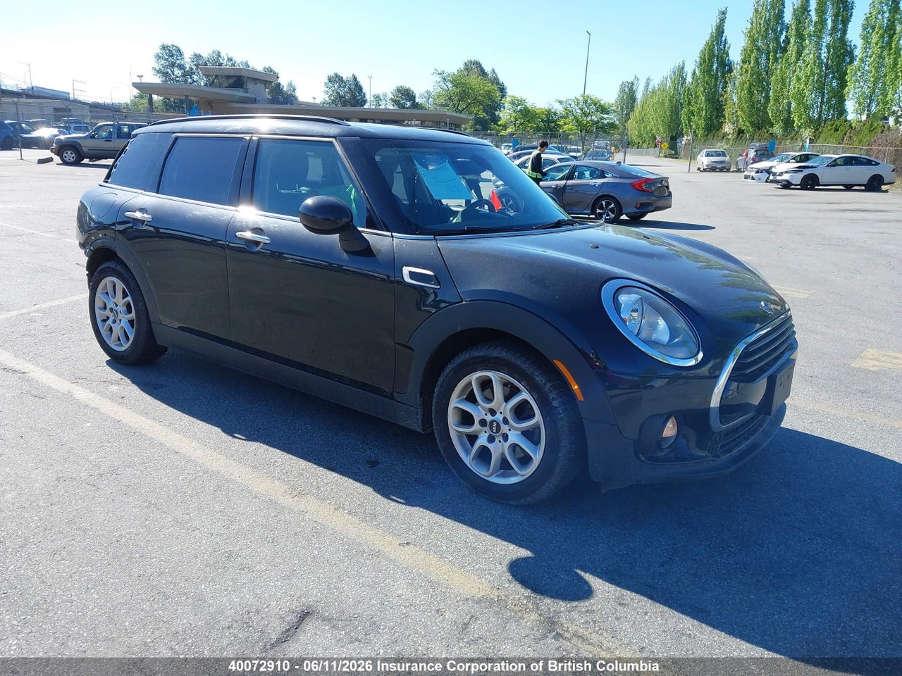 WMWLN5C56G2E29340 · 2016 MINI COOPER CLUBMAN