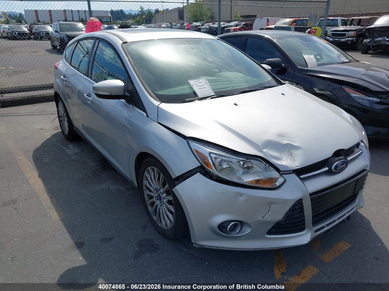 1FAHP3N20CL296205 · 2012 FORD FOCUS TITANIUM