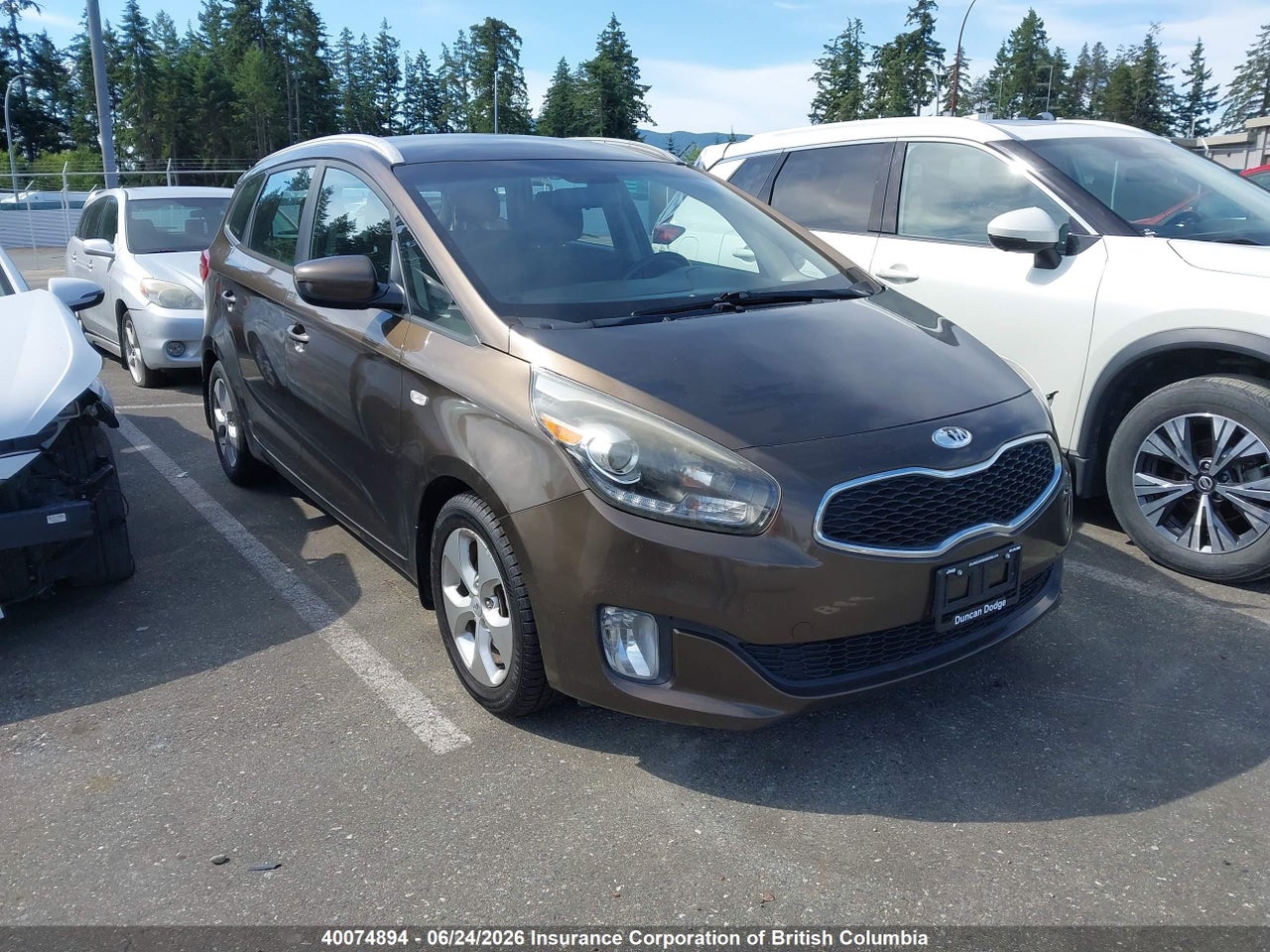 KNAHT8A30E7045307 · 2014 KIA RONDO