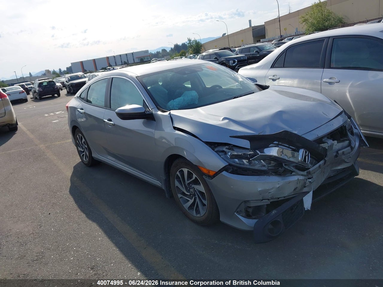 2HGFC2F62JH015185 · 2018 HONDA CIVIC LX