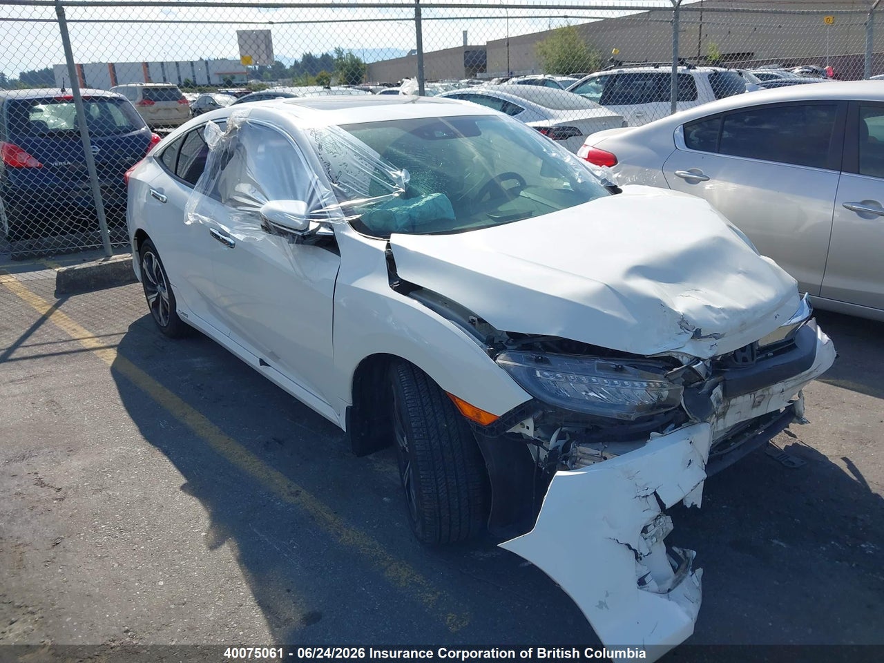 2HGFC1F9XGH107402 · 2016 HONDA Civic touring