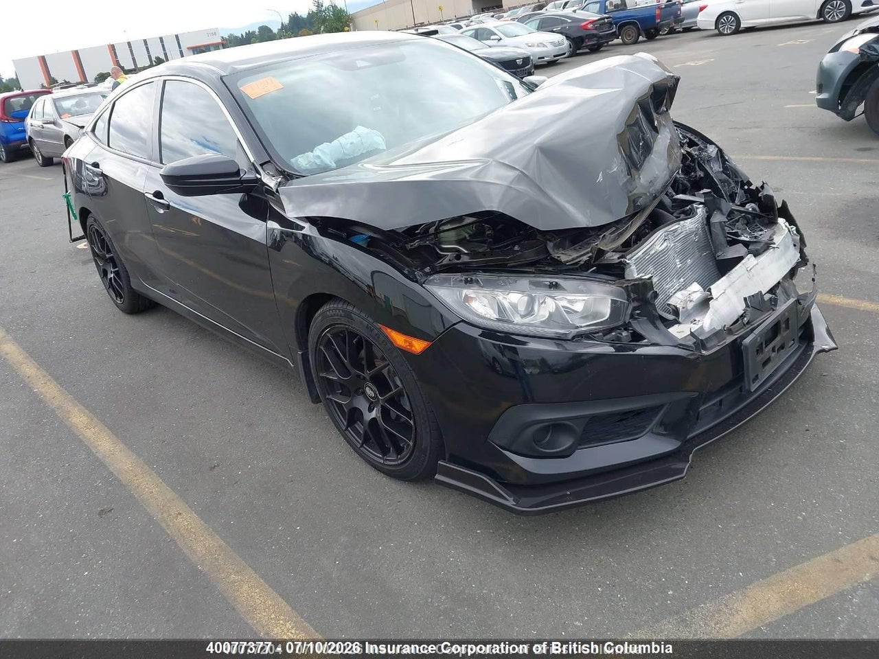 2HGFC2F64JH029637 · 2018 HONDA CIVIC LX
