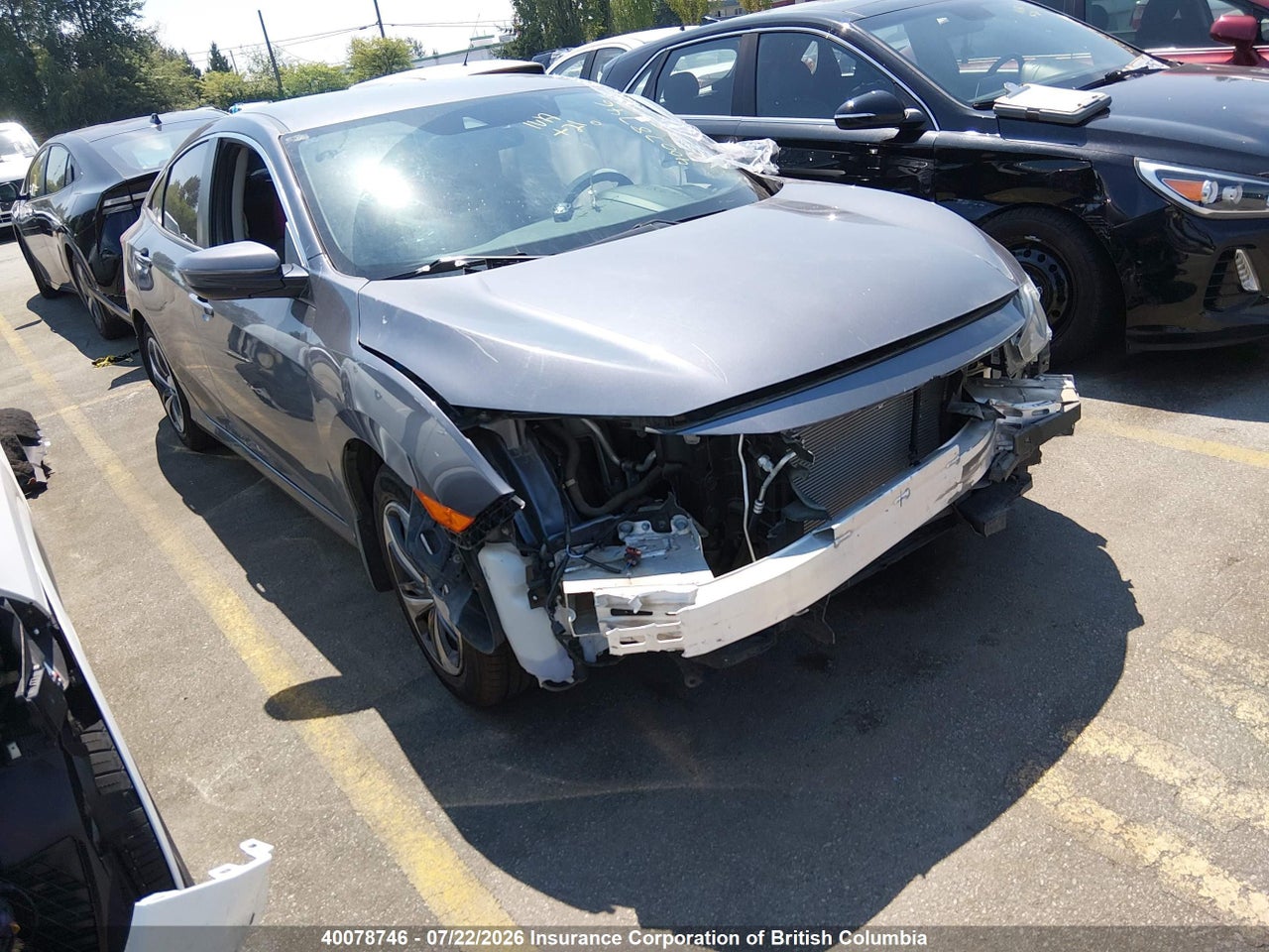 2HGFC2F54LH033214 · 2020 HONDA CIVIC LX