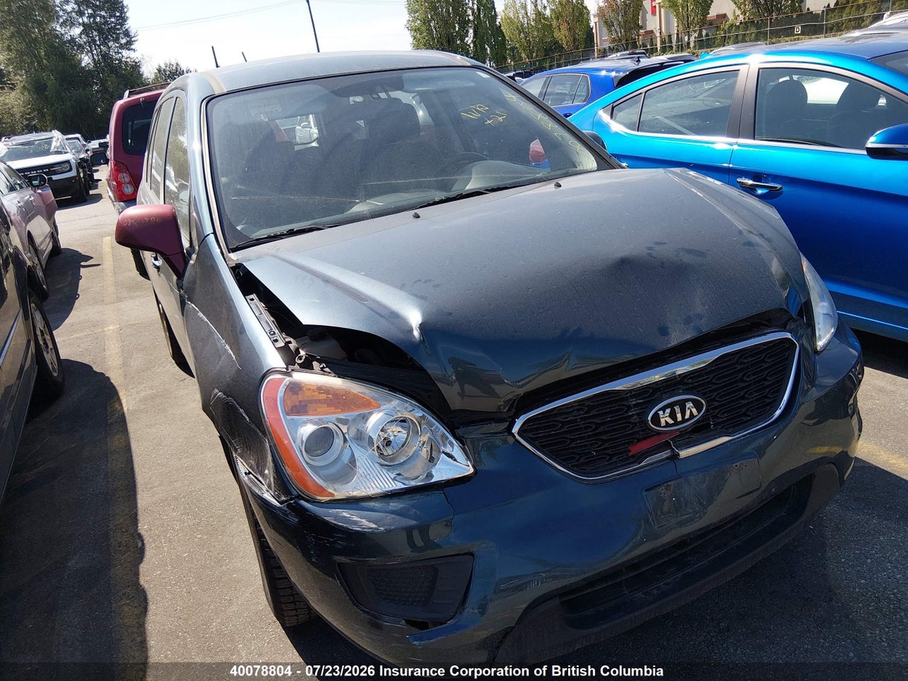 KNAHG8A85C7410609 · 2012 KIA RONDO