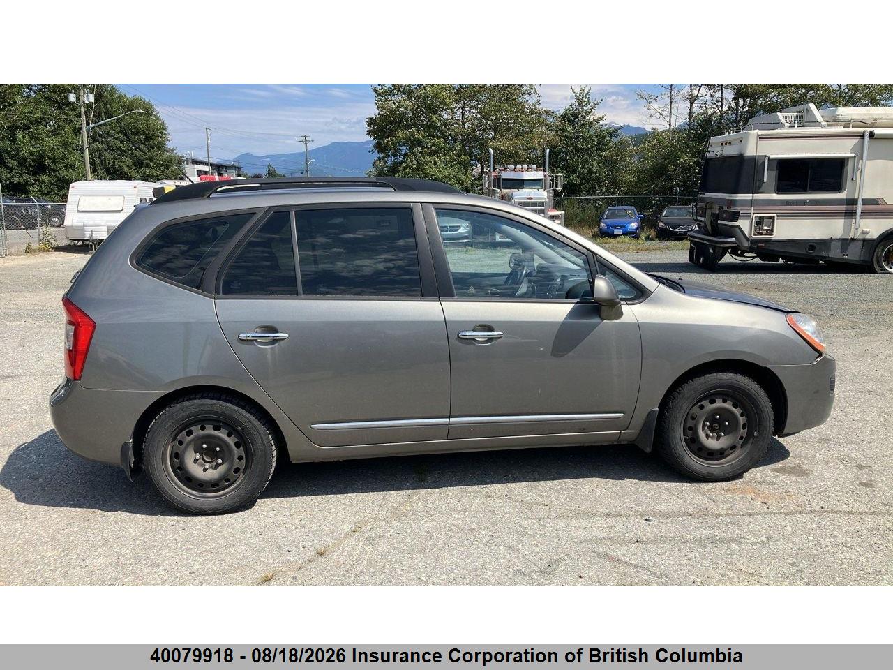 KNAFG528997256337 · 2009 KIA RONDO · 8/24
