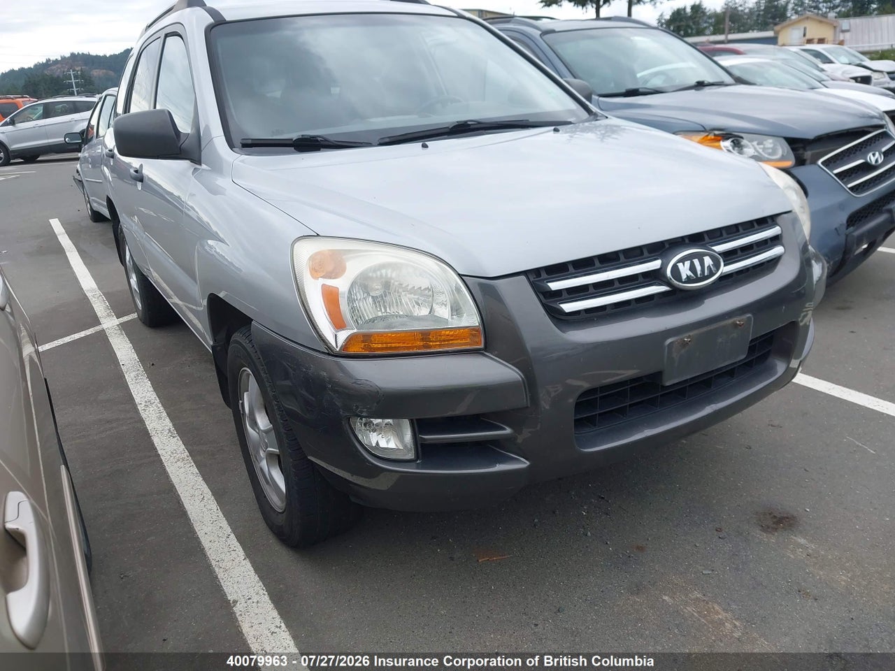 KNDJF722377438037 · 2007 KIA Sportage LX