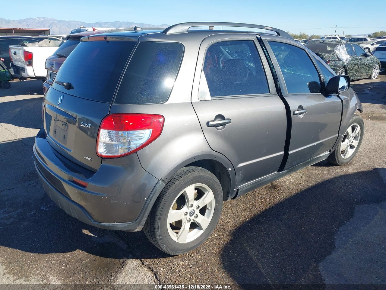 2012 SUZUKI SX4 PREMIUM/TECH VALU PKG (NAV) · 4/10