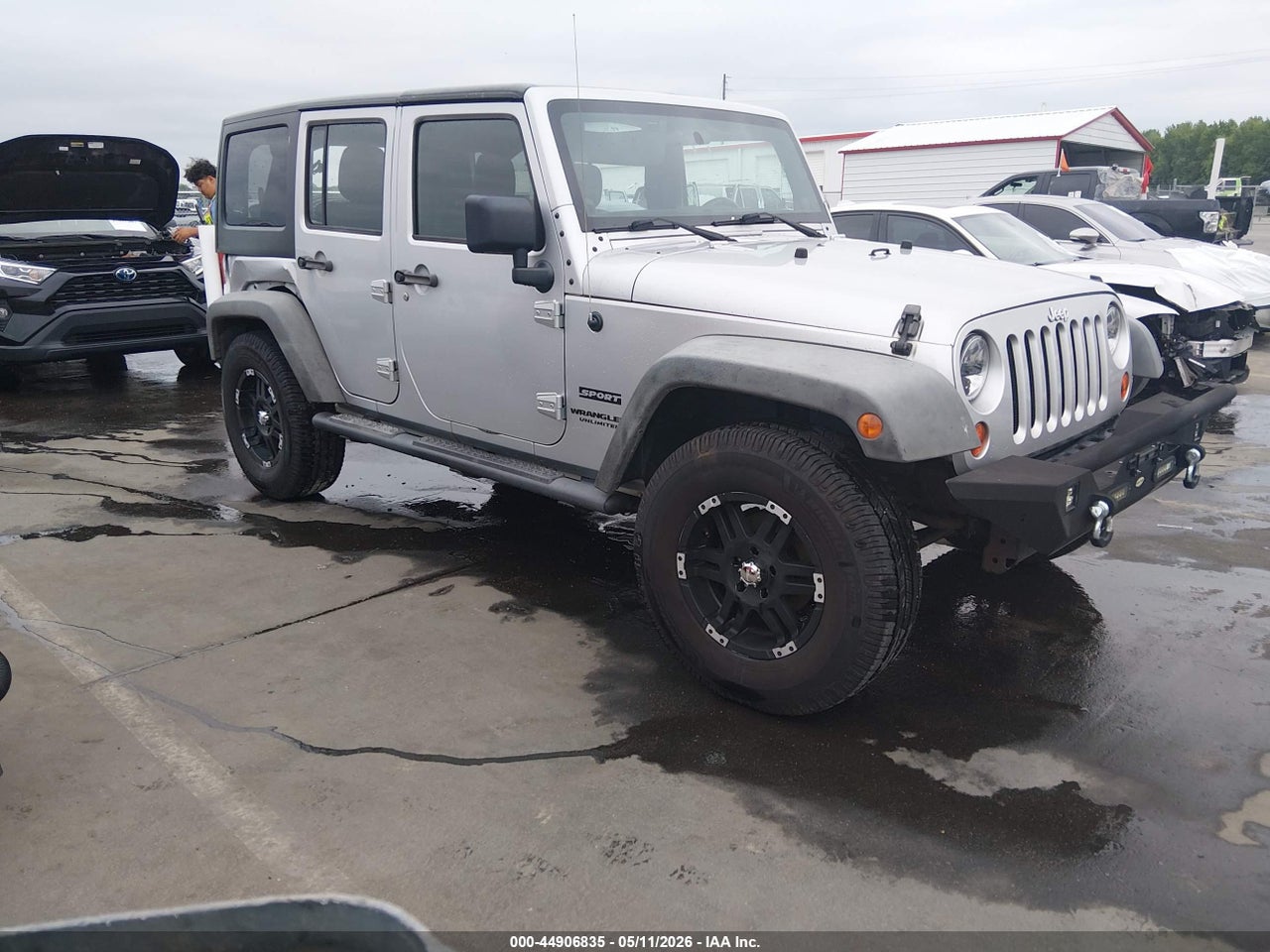 1J4BA3H19BL****** · 2011 JEEP WRANGLER UNLIMITED SPORT