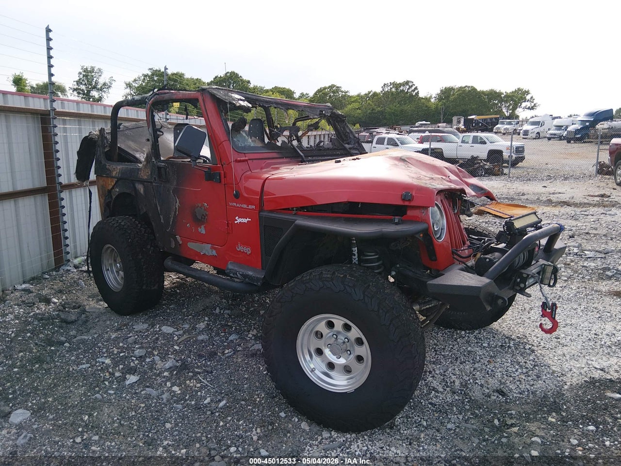 1J4FA49S22P****** · 2002 JEEP WRANGLER SPORT