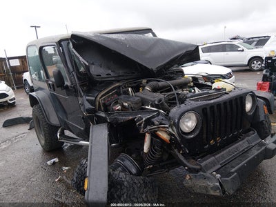1J4FA49S75P****** · 2005 JEEP WRANGLER SPORT