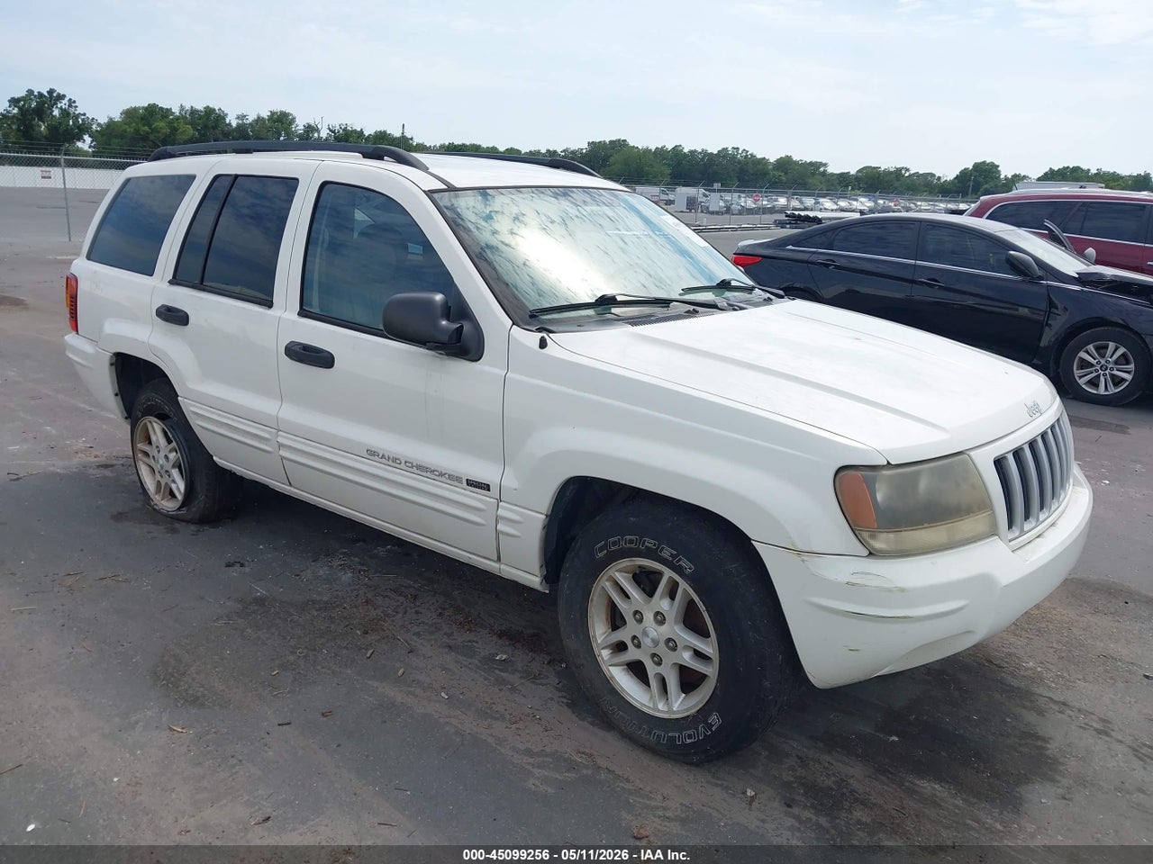 1J4GX48S74C****** · 2004 JEEP GRAND CHEROKEE LAREDO