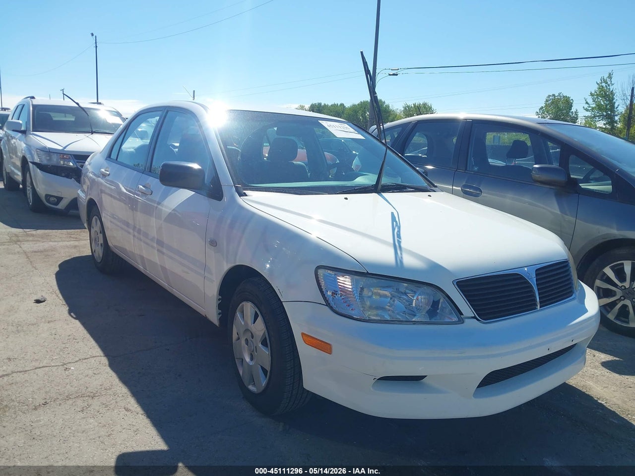 JA3AJ26E72U****** · 2002 MITSUBISHI LANCER ES