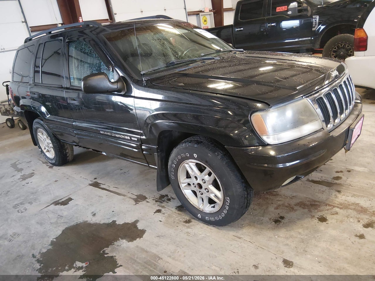 1J4GW48S12C****** · 2002 JEEP GRAND CHEROKEE LAREDO