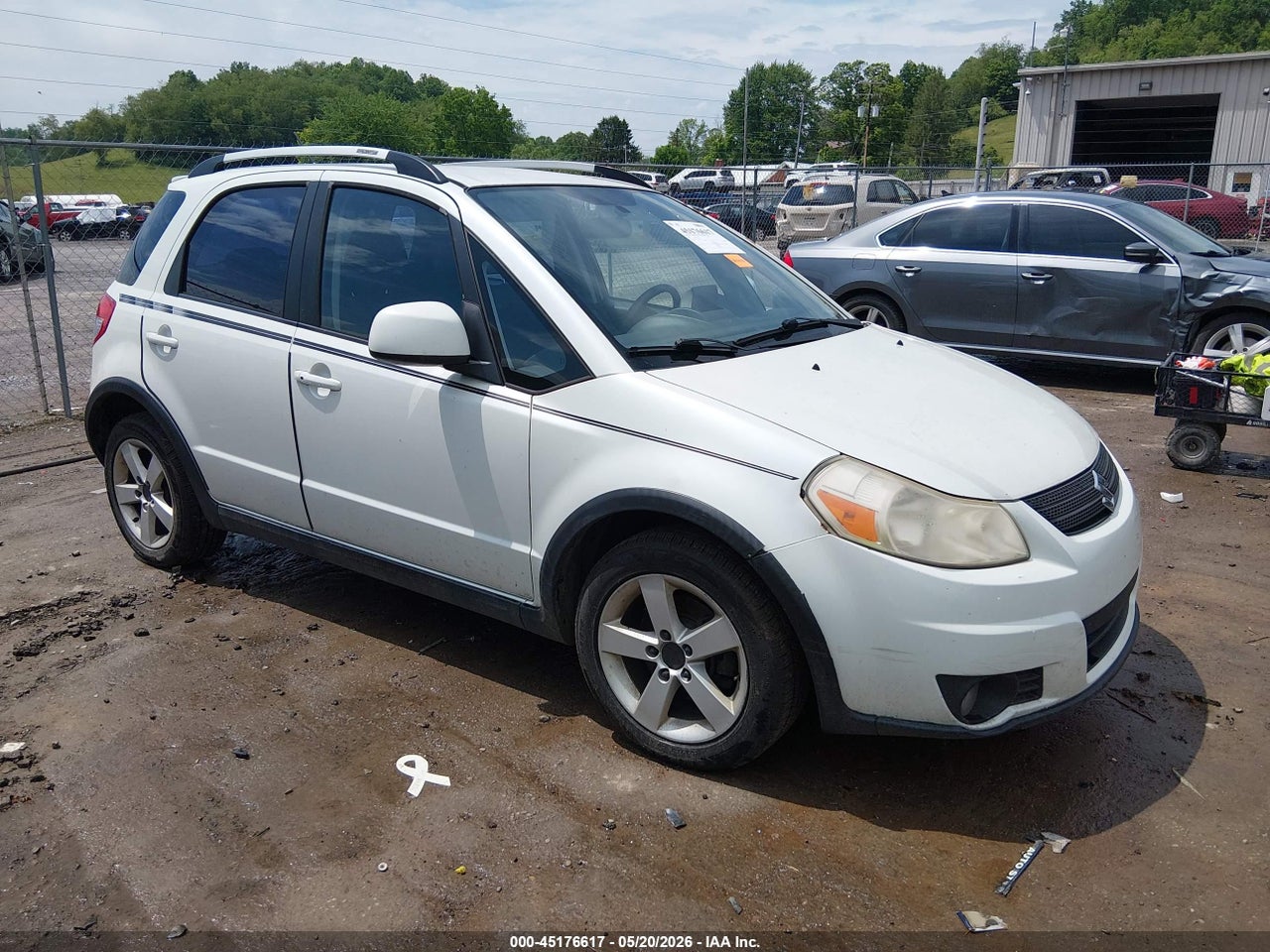 JS2YB417396****** · 2009 SUZUKI SX4 TOURING